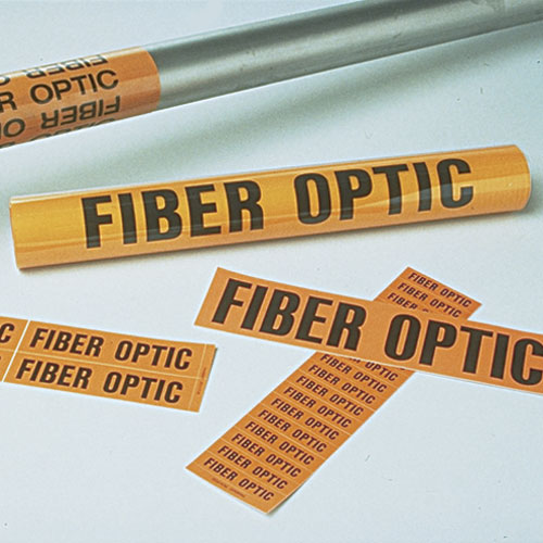 Product image for Panduit PCV-FOCAY Voltage Marker, Vinyl, 'FIBER OPTIC CABLE', 9"Wx2.25"H, 1/cd, 5 cds/pk, Black/OR