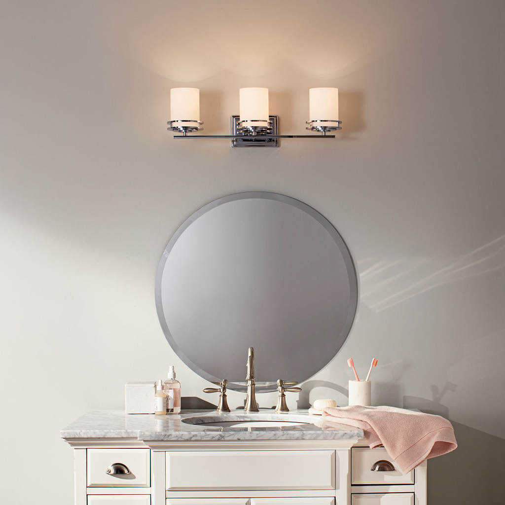 Product image for Kichler 5078CH Hendrik™ 24" 3 Light Vanity Light with Satin Etched Cased Opal Glass Chrome