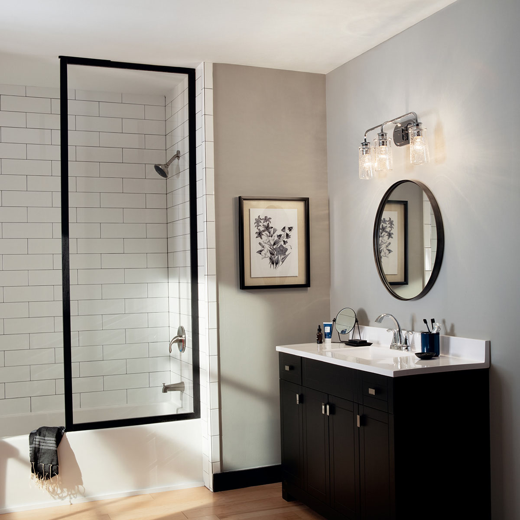 Product image for Kichler 45459CH Braelyn™ 24" 3 Light Vanity Light with Clear Seeded Glass Chrome