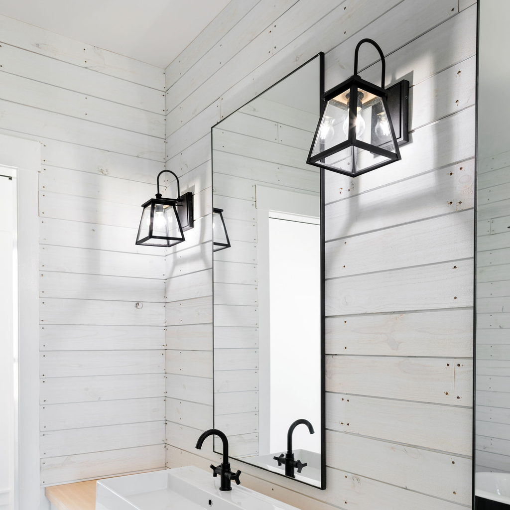 7.5" W x 14.5" H x 10" E Tall 1-Light Clear Glass Outdoor Wall Lantern in Black