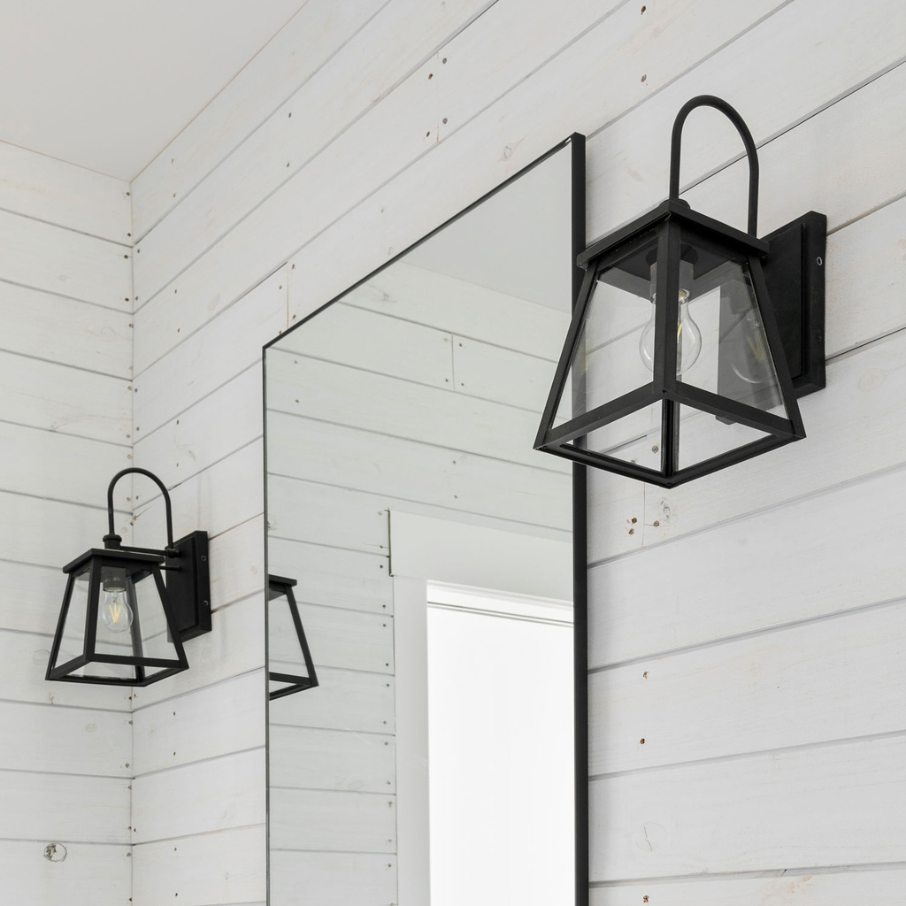 7.5" W x 14.5" H x 10" E Tall 1-Light Clear Glass Outdoor Wall Lantern in Black